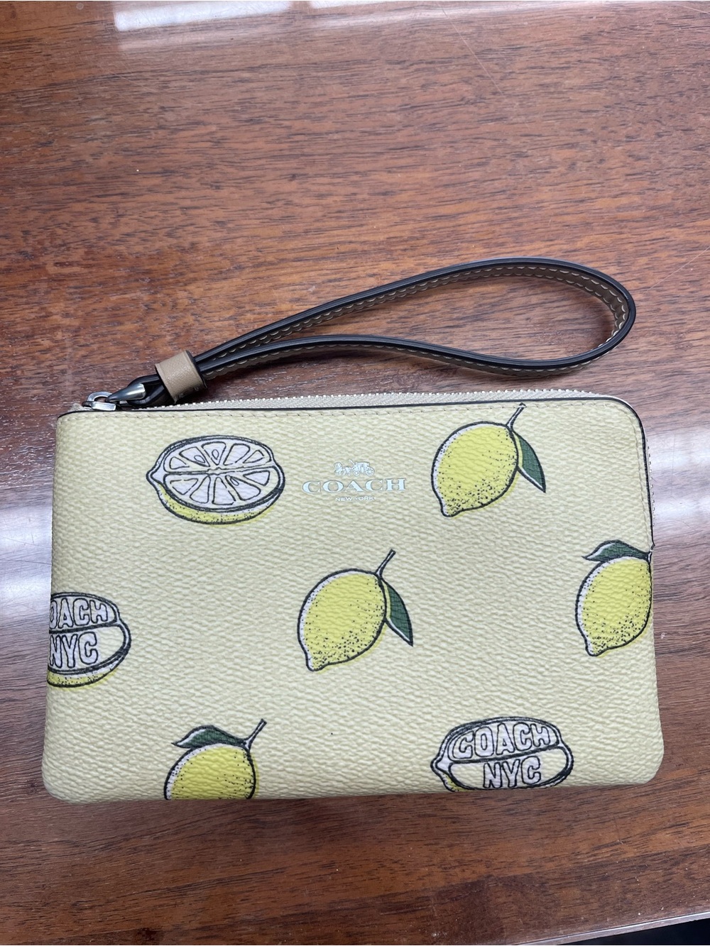 COACH Lemon Print Wristlet Pouch - Pale Yellow with Brown Strap